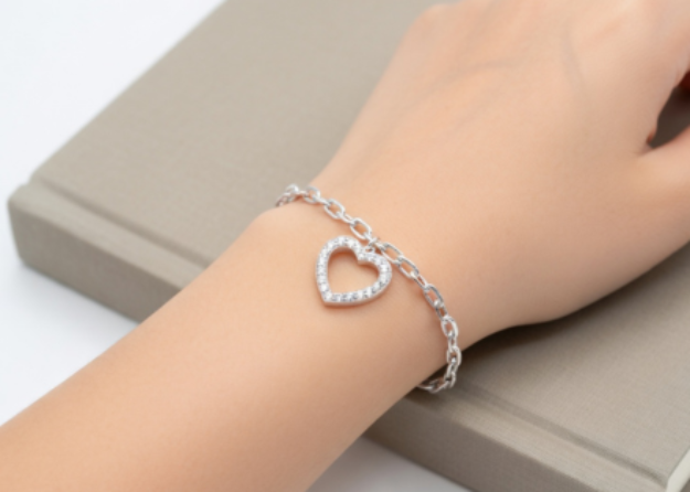 silver plated CZ heart charm bracelet