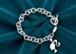 silver charm bracelet with toggle clasp