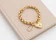 gold plated toggle heart charm bracelet