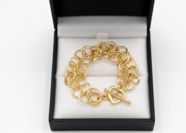 gold plated hollow round toggle bracelet